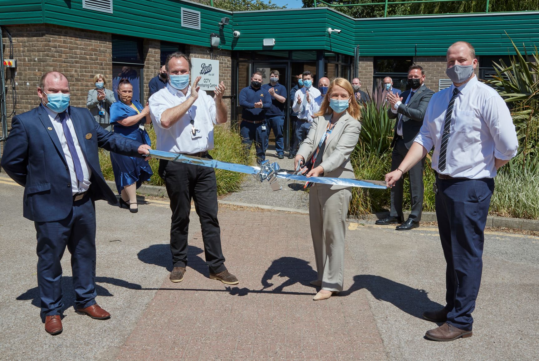 Seb James, Katy Bourne OBE and Boots team members officially open the CCTV Monitoring Centre